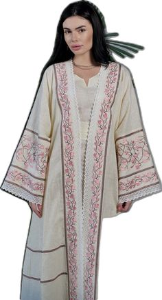 Beige Cotton Kaftan For Spring, Folk Style Long Sleeve Kimono For Spring, Spring Long Sleeve Kaftan With Intricate Embroidery, Elegant Spring Kaftan With Embroidered Sleeves, Spring Long Sleeve Cotton Kaftan, Spring Long Modest Kaftan, Spring Wedding Embroidered Kaftan, Bohemian Abaya With Floral Embroidery For Spring, Long Abaya For Spring Wedding