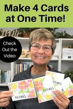 a woman holding up two cards with the words, make 4 cards at one time