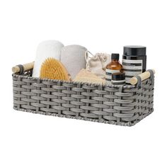 a gray basket filled with personal care items