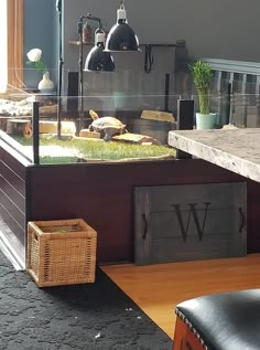 a table that has some food on top of it in front of a window with the letter w