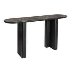 a black wooden table sitting on top of a white wall