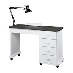 an office desk with a lamp on top of it and drawers underneath the desk,