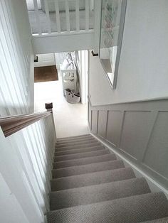 an image of stairs going up and down the house