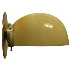 an image of a yellow wall light on a white background