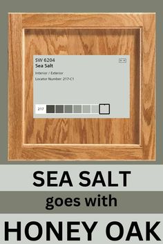 a wooden frame with the words sea salt goes with honey oak in black and white