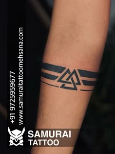 an arm with a tattoo on it and the words samurai tattoo written in black ink