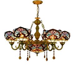 an ornate chandelier with stained glass shades