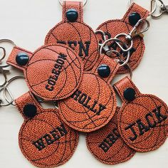 basketball keychains with personalized name tags on them