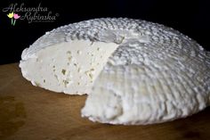 a piece of cheese that is sitting on a table