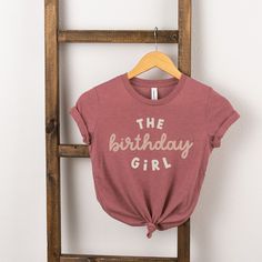 Looking for a cute tee for your kids? We have the perfect The Birthday Girl graphic tee addition to their closet! Also available in toddler tees. First Birthday Graphic Tee With Short Sleeves, First Birthday Graphic Tee With Crew Neck, Pink Graphic Tee For Playtime, Pink Graphic Print T-shirt For First Birthday, Toddler Girl Valentines Shirt, Girls Graphic Tee, Toddler Tees, Sleeve Styles, Toddler Girl