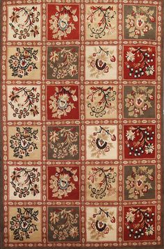 a red and beige rug with many different designs on the front, back and sides