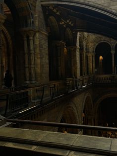 the interior of an old building with stone arches