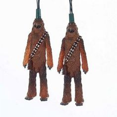 two star wars chew - o - ween ornaments hanging from strings