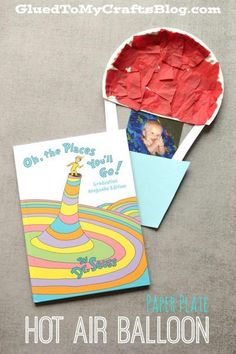 the paper plate is next to an envelope with a photo on it and a card that says oh, the places you'll go