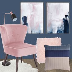 a pink chair sitting next to a blue wall with two paintings on the wall behind it