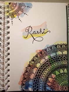 a spiral notebook with the word raah written in cursive writing