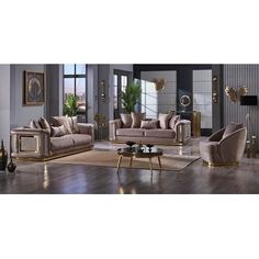 a living room filled with furniture on top of a hard wood floor covered in rugs