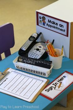 there is a desk with some school supplies on it