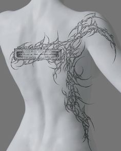 the back of a woman's body with tattoos on it