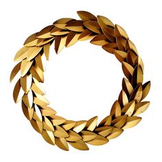 a golden wreath made out of leaves on a white background