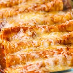 baked enchiladas in a glass baking dish