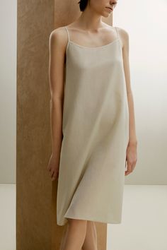 New from our 2022 Spring & Summer Collection, the Silk Cotton Slip Pajama Dress blends elegance and comfort for every evening this summer with a combination of fine silk and skin-friendly cotton — absolutely breathable and effortless to wear, with exquisitely refined design and details that allow you to move to your own rhythm and free your mind. Details Materials & Care Shipping & Returns • Designed in a subtle A-shape: a natural fit with a feminine touch. • Perfectly blends crisp, breathable c