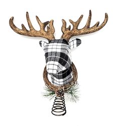 a deer head with antlers and plaid shirt hanging from it's back end