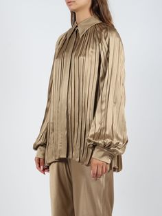 Alberta Ferretti pleated satin shirt. - FW24 - Regular fit - Pointed collar - Hidden button closure - Raglan sleeve - Single-button cuffs - Asymmetric hem - Made in Italy - 64% Acetate, 36% Silk Elegant Pleated Silk Blouse, Elegant Silk Pleated Blouse, Formal Pleated Silk Blouse, Chic Pleated Silk Top, Elegant Pleated Silk Tops, Chic Silk Pleated Top, Elegant Blouse With Folds For Spring, Elegant Spring Shirt With Pleated Details, Elegant Pleated Shirt For Spring