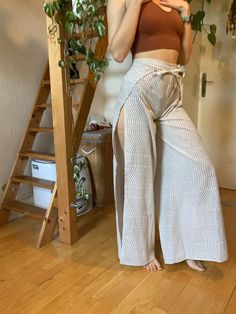 "Handmade wrap pants that can be adjusted at the waist.  🌿 I sew the pants to be a little on the longer side, if you have shorter legs I will adjust them to your length for free! Waist starts at: 55cm / 22\" Leg inseam: 77cm / 30\" It works by wrapping one side around you, making a bow in the back. Then passing the fabric through under your legs and wrappjung the other bow in the front.    All my products are made by myself in my little bedroom in germany and are not 100% perfect. Im not a prof Casual White Split Bottoms, White Split Bottoms For Spring, Bohemian Style High Waist White Wide Leg Pants, Bohemian White High Waist Wide Leg Pants, Bohemian Style White High Waist Wide Leg Pants, White Wide-leg Pants With Tie Waist, Summer Cotton Wrap Bottoms, Summer Wrap Cotton Bottoms, White Tie Waist Beach Pants