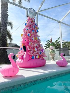 Pink flamingo. Pool floaty Christmas. Pink Christmas. Christmas in Florida. Christmas in California. Tropical Christmas. I love flamingos. Pool Christmas poolside Christmas tree. Unique Christmas. Outdoor Christmas decor. Pink flamingo ornament Beachball Christmas tree. Beachy Christmas. Christmas at the coast. Pool house Christmas tree. Beachy Christmas Decorations, Christmas In California, Christmas In Florida, Christmas In July Decorations, Christmas Tree Unique, Christmas Decor Pink, Pink Flamingo Pool, Beach Christmas Decorations, Flamingo Ornament