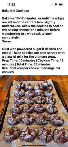 a baking sheet with chocolate cookies on it and an article about how to bake them