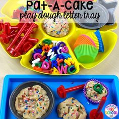 play dough letters tray with cupcakes and toys