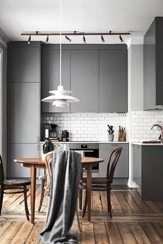 the kitchen is clean and ready to be used as a dining room or living area