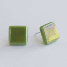 "These beautiful green glass studs make a wonderful gift for any woman! The lovely iridescent green color and the delicate style of these geometric earrings, makes them a beautiful everyday earring that can be worn with all kinds of outfits for any occasion.  They are great for ladies who like minimal jewelry and since they are also hypoallergenic and do not contain nickel, they are also good for people with skin sensitivities. Handmade in Greece, these cute glass earrings will be a lovely acces Green Stud Earrings, Vip Club, Iridescent Green, Minimal Jewelry, Stud Earrings For Women, Earrings Unique, Square Earrings, Green Earrings, Everyday Earrings