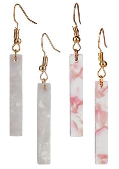 three different types of earrings with gold hooks and white marbles on them, all hanging from earwires