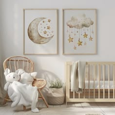 a baby's room with two posters and a crib