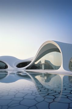 an artistic rendering of a futuristic building with curved windows and water reflecting on the ground