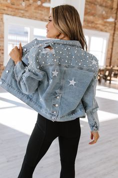 Upgrade your wardrobe with this Distressed Star Cropped Denim Jacket! With its trendy star design and distressed details, this jacket adds a touch of edginess to any outfit. Made from high-quality denim, it's durable and stylish. Stay on trend and elevate your style with this must-have statement piece. Model Info: Models are 5'7", Size 2, wearing smalls Fabric: 85% Cotton + 15% Polyester Jeans Jacket Design, Denim And Diamonds Party Outfit Ideas, Bedazzled Jean Jacket, Denim And Diamonds Party Outfit, Patch Jean Jacket, Jean Jacket Design, Jean Jacket Diy, Bedazzled Jeans, Diy Denim Jacket