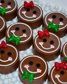 chocolate candies decorated to look like faces with bows