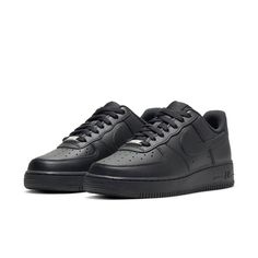 The Nike Air Force 1 '07 'Triple Black' offers a stylish and durable sneaker with traditional features and iconic branding. It is crafted with a low-cut silhouette, stitched overlays, a padded collar, breathable toe perforations, foam midsoles and Air cushioning. Additionally, the rubber outsole provides traction and durability for all-day wear. With its timeless design and sleek colorway, this is a must-have for any Nike Air Force 1 Lover. Air Force Noir, Air Force 1 Noir, Zapatillas Nike Air Force, Black Air Force 1, Dr Shoes, Air Force One, Mens Designer Shoes, Nike Air Force 1 07, Triple Black