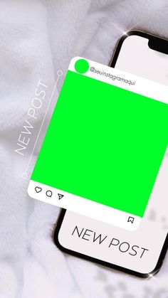 a cell phone with a green screen sitting on top of a white bed sheet that says newpost