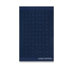 the louis vuitton pocket notebook in navy blue with an intricate pattern on it