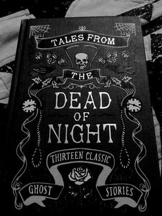 a sign that reads tales from the dead of night