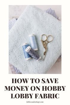 sewing thread, scissors and spools on a white cloth with text overlay how to save money on hobby lobby fabric