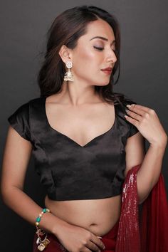 As if you wear simplicity as a crown, this blouse is made with slightly stretchable satin fabric with glossy finish which is utmost perfection to pair with any saree. Comfort and Class - You got it! Blouse Color : Black Blouse Fabric : Stretchable Satin Fabric Blouse Design: As seen - Front and back Sweetheart neck Custom Options: Customizable Neckline Occasion : Literally ANY Occasion! Party, Wedding, Bridesmaid, Festive Work : No Work Disclaimer: There will be slight difference in digital to actual image Satin V-neck Party Blouse, Sleek V-neck Party Blouse, Black V-neck Blouse For Party, Elegant Satin Choli For Festive Occasions, Elegant V-neck Blouse Piece, Elegant Festive Satin Choli, Elegant Fitted V-neck Blouse Piece, Party Satin Unstitched Blouse Piece, Fitted Silk Blouse Piece For Party Wear