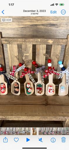 a wooden bench with christmas decorations on it