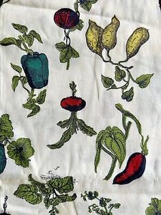 the fabric has many different vegetables on it