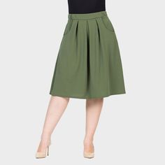 This perfect spring and summer skirt features large pleats at the waist, creating a flattering flared silhouette. With a wide elastic waistband and convenient side pockets, this knee-length plus-size skirt is both stylish and functional. Easily transition from casual to dressy with the right accessories. Crafted from a breathable, stretchy polyester-spandex blend, it’s ideal for staying comfortable in warmer weather. Midi Denim, Denim Midi Skirt, Ladies Of London, Plus Size Skirts, Hem Style, Summer Skirts, Bottom Clothes, Skirts With Pockets, Skirt Length