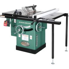 a green table saw sits on top of a black and white stand with the word minnesota printed on it