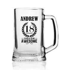 a glass mug with the name and age on it